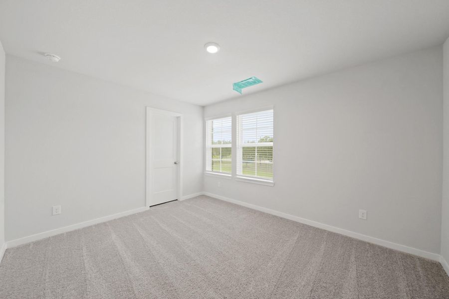 Spacious, unfurnished interior of a new home in Valor Park, Bay City (Image 19).
