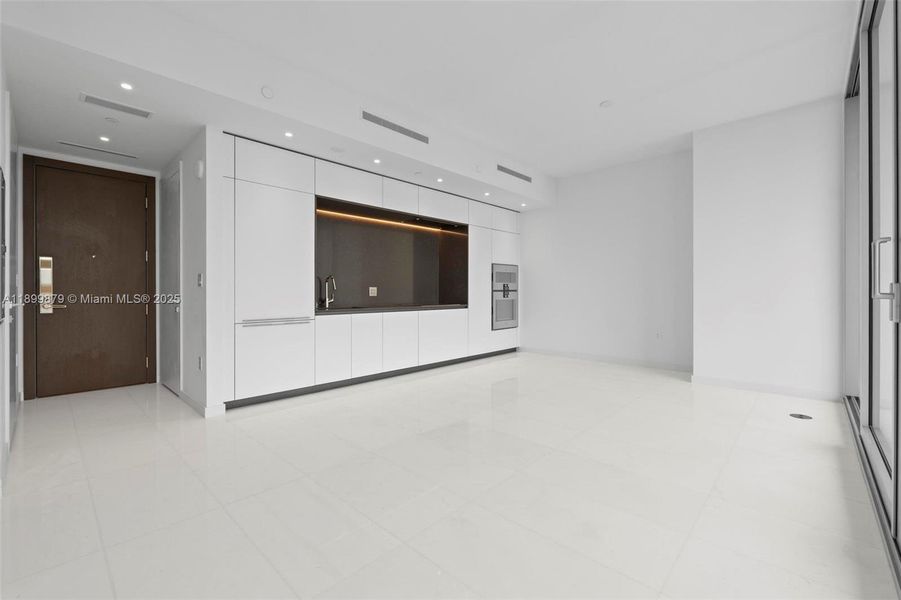 Spacious, unfurnished interior of a new home in Aston Martin Residences, Miami (Image 15).