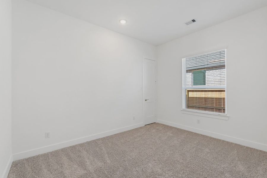Representative unfurnished interior of a home built from the Brentwood by Chesmar Homes in Meridiana 50's and 60's, Manvel (Image 22).
