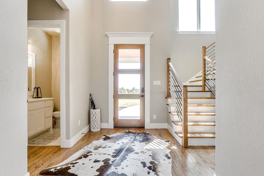 Representative furnished interior of a home built from the Rolling Wood by Trinity Classic Homes in Freeman Ranch, Weatherford (Image 6).