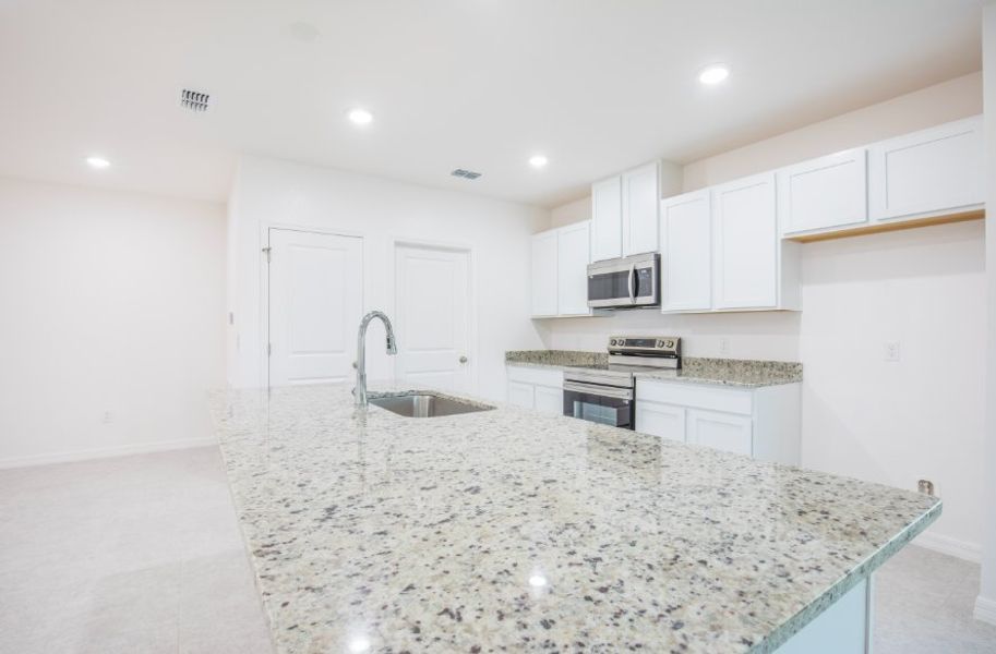 Furnished interior view inside a new home in Cape Coral, Cape Coral (Image 5). Furnished interior view inside a new home in Cape Coral, Cape Coral (Image 5).