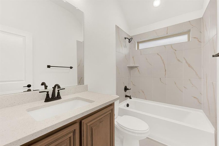 Full bath shared between bedroom 1 and 2 Full bath shared between bedroom 1 and 2