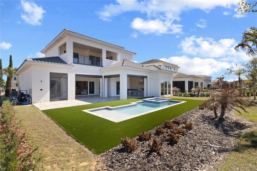 Exterior details and patio area of a home in Bella Collina, Montverde (Image 26).