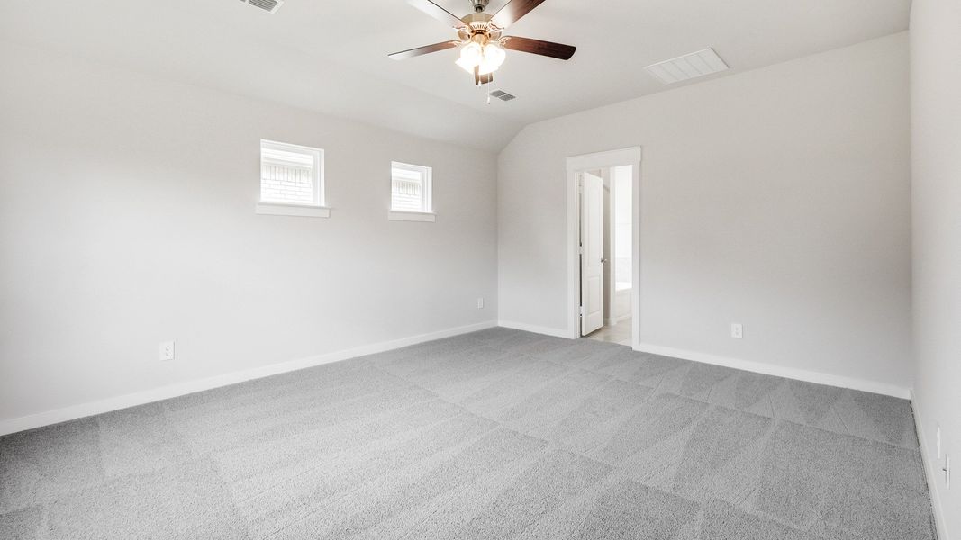 Representative furnished interior of a home built from the Meyerson by Brightland Homes in Sunterra, Katy (Image 11).