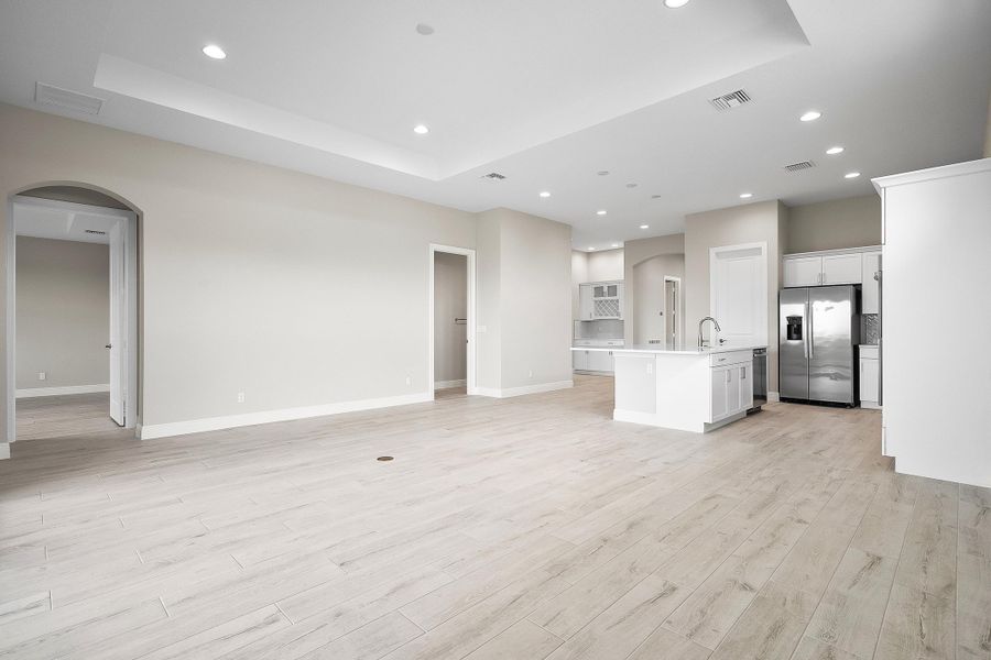 Great Room to Kitchen | 12471 SW Sunrise Lake Terrace