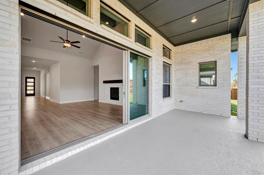 Exterior details and patio area of a home in Northshore at Lakewood Village - Garden Series, Lakewood Village (Image 3). Exterior details and patio area of a home in Northshore at Lakewood Village - Garden Series, Lakewood Village (Image 3).