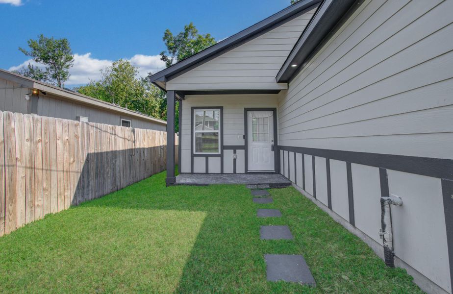 Exterior details and patio area of a home in , Houston (Image 4). Exterior details and patio area of a home in , Houston (Image 4).