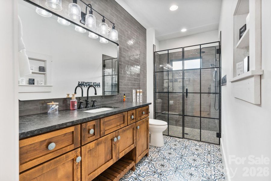 2nd full bath on upper level with rustic vanity 2nd full bath on upper level with rustic vanity