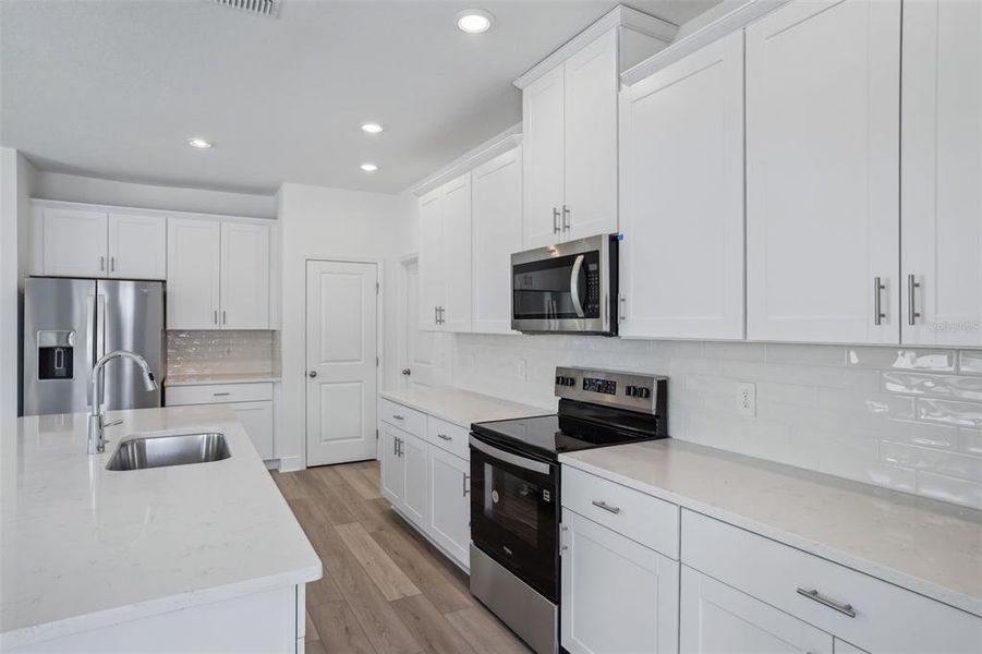 Furnished interior view inside a new home in Cyrene at Minneola - Villas, Montverde (Image 10). Furnished interior view inside a new home in Cyrene at Minneola - Villas, Montverde (Image 10).
