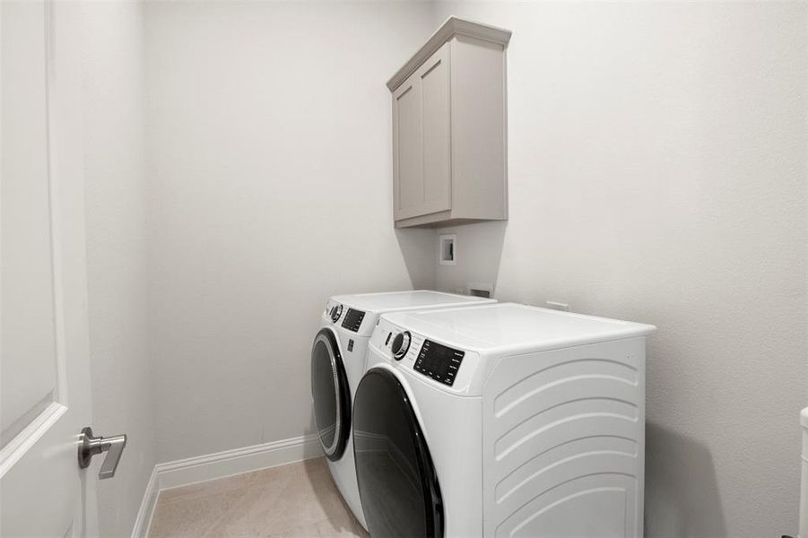 Utility Room w/built in cabinets