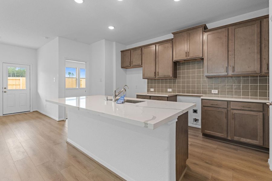 This kitchen is not only a functional space but also has ample storage. Whether you're a seasoned chef or just love to gather and enjoy good food, this kitchen is a dream come true. This kitchen is not only a functional space but also has ample storage. Whether you're a seasoned chef or just love to gather and enjoy good food, this kitchen is a dream come true.