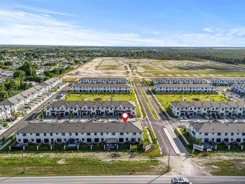 Front exterior of a new home in , Homestead, FL, highlighting curb appeal (Image 27). Front exterior of a new home in , Homestead, FL, highlighting curb appeal (Image 27).