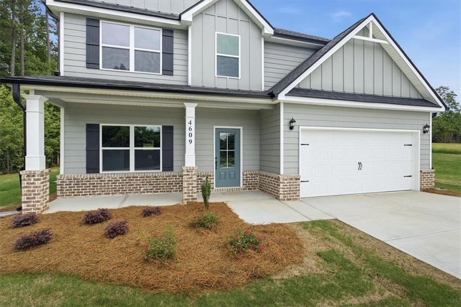 Front exterior of a new home in , Stockbridge, GA, highlighting curb appeal (Image 19). Front exterior of a new home in , Stockbridge, GA, highlighting curb appeal (Image 19).