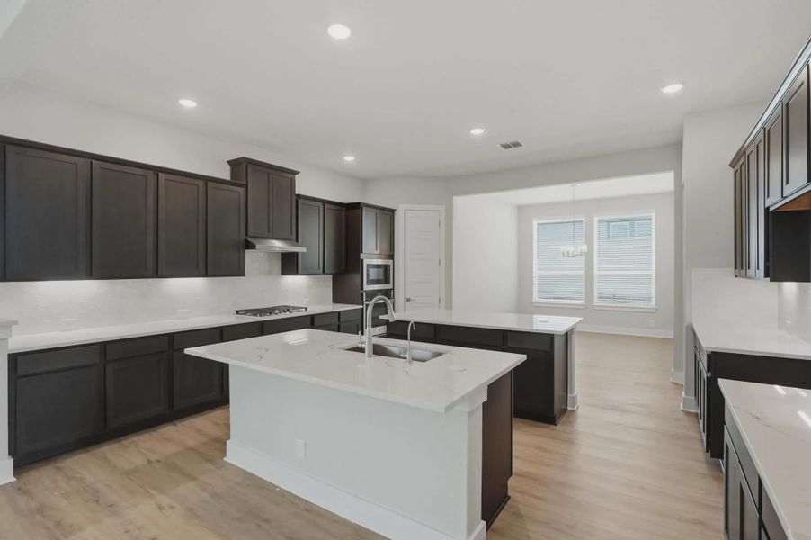 Representative furnished interior of a home built from the Cohen by Chesmar Homes in Esperanza 60's, Boerne (Image 3).