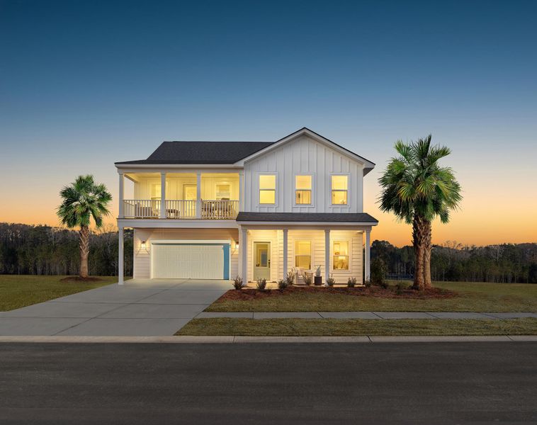 Front exterior of a new home in , Ravenel, SC, highlighting curb appeal (Image 1). Front exterior of a new home in , Ravenel, SC, highlighting curb appeal (Image 1).
