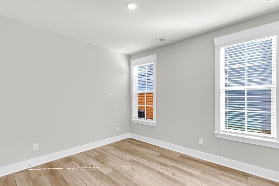 Spacious, unfurnished interior of a new home in Hewing Farms, Summerville (Image 42).