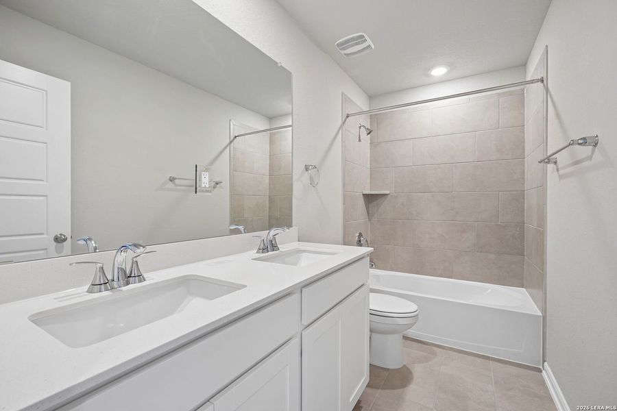 Furnished interior view inside a new home in Remington Ranch, San Antonio (Image 9).
