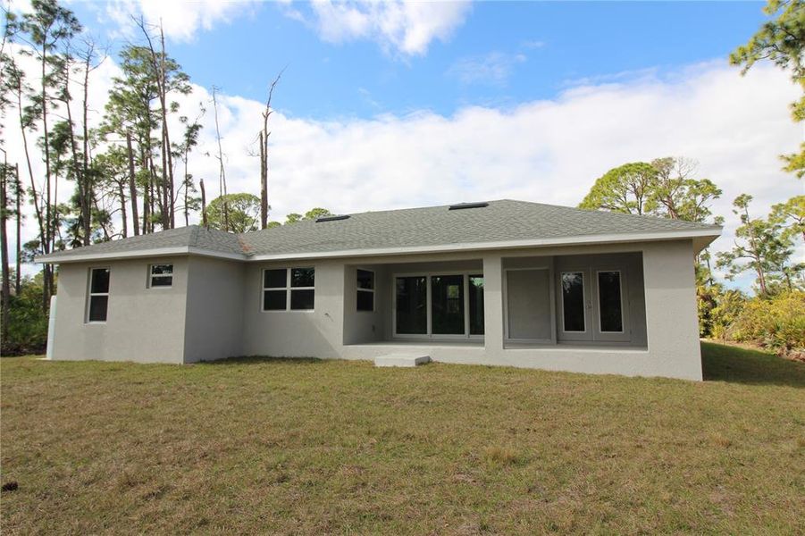 Exterior details and patio area of a home in , Port Charlotte (Image 17).