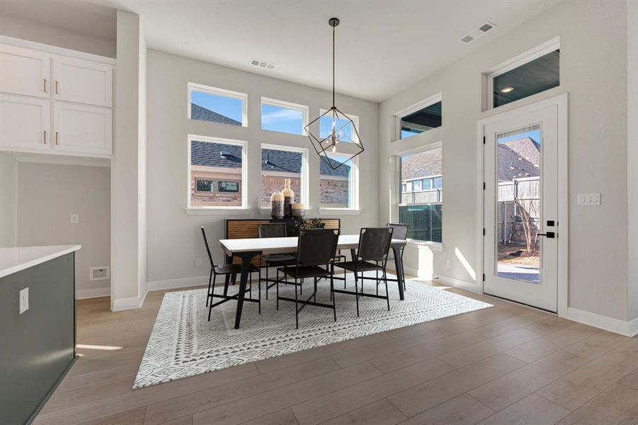 Dining room featuring light wood finished floors