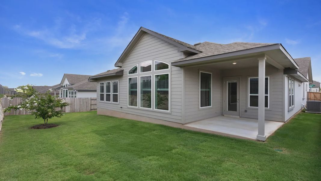 Exterior details and patio area of a home in Santa Rita Ranch, Liberty Hill (Image 24).