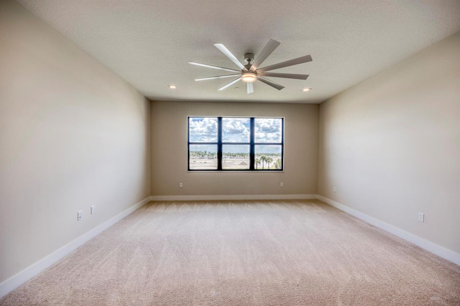 Furnished interior view inside a new home in Apex at Avenir, Palm Beach Gardens (Image 35).