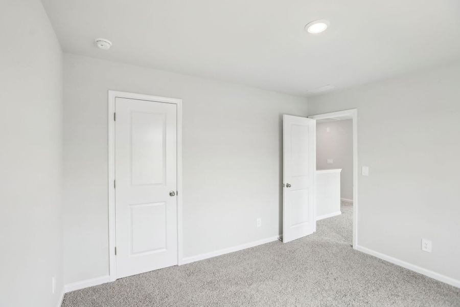 Spacious, unfurnished interior of a new home in Hemingway - Reserve Series, Cumming (Image 16). Spacious, unfurnished interior of a new home in Hemingway - Reserve Series, Cumming (Image 16).