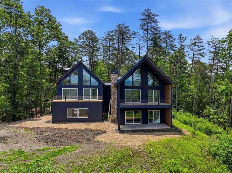 Front exterior of a new home in , Ellijay, GA, highlighting curb appeal (Image 1). Front exterior of a new home in , Ellijay, GA, highlighting curb appeal (Image 1).