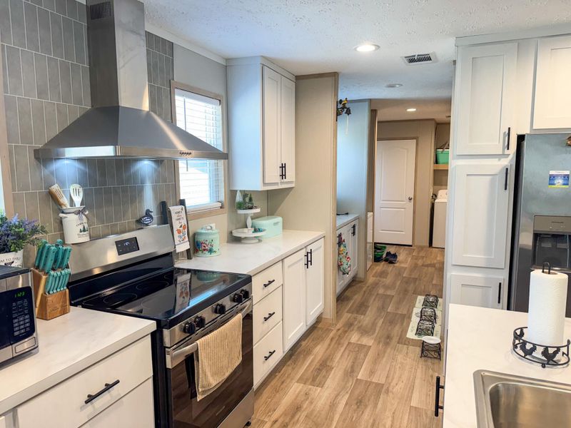 Furnished interior view inside a new home in , Cottageville (Image 3).