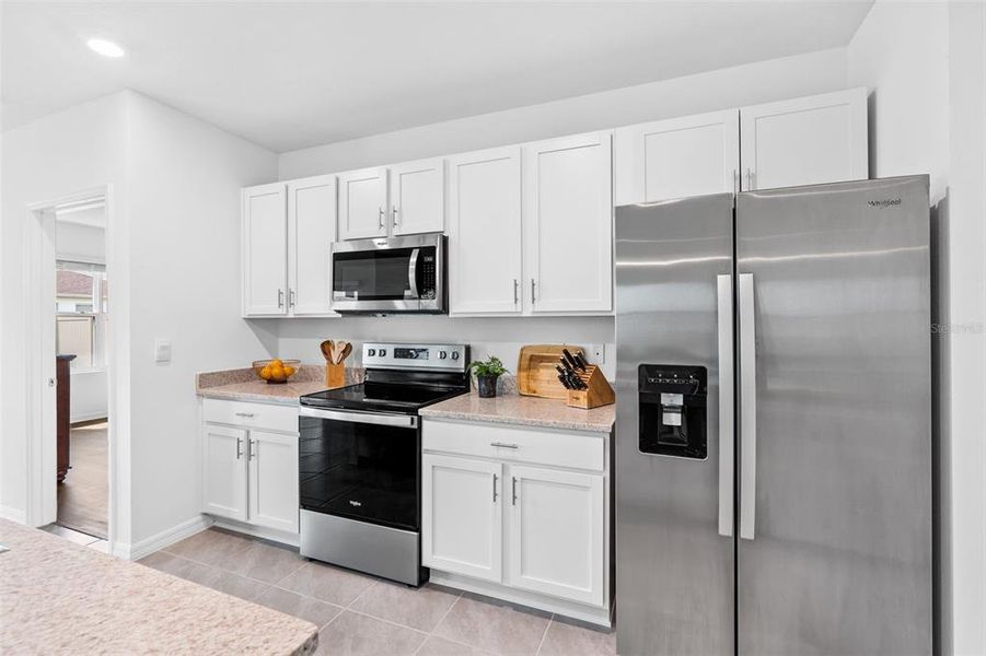 Added Cabinets Above Fridge