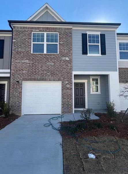 Front exterior of a new home in Chestnut Grove, Douglasville, GA, highlighting curb appeal (Image 1). Front exterior of a new home in Chestnut Grove, Douglasville, GA, highlighting curb appeal (Image 1).