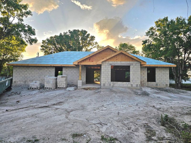 Front exterior of a new home in , Okeechobee, FL, highlighting curb appeal (Image 2).