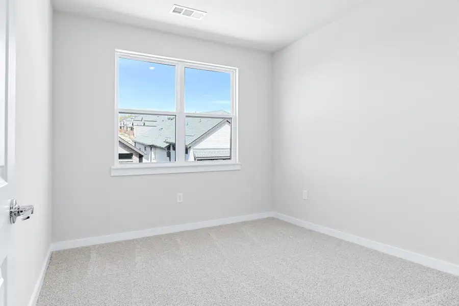 Spacious, unfurnished interior of a new home in Willow Grove Townhomes, Melissa (Image 34).
