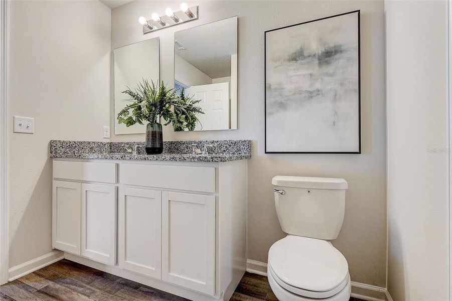 Furnished interior view inside a new home in Eagle Hammock, Eagle Lake (Image 31).