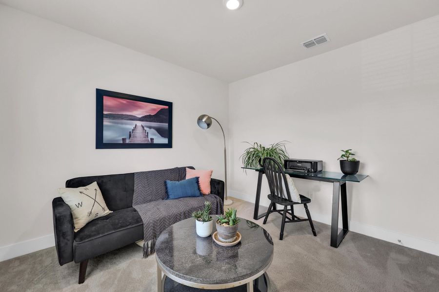 Furnished interior view inside a new home in Jasmine Point at Lakes of Cane Bay, Summerville (Image 13).