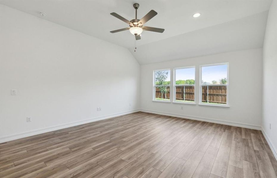 Airy gathering room with large windows  *real home pictured