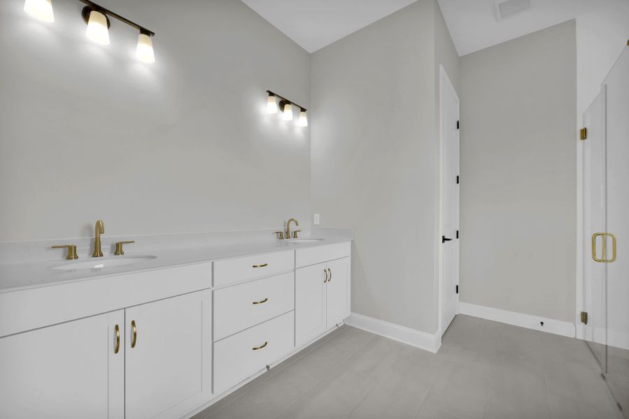 Representative furnished interior of a home built from the Tomoka by Riverside Homes in Hidden Creek at SilverLeaf Phase 1, St. Augustine (Image 21).
