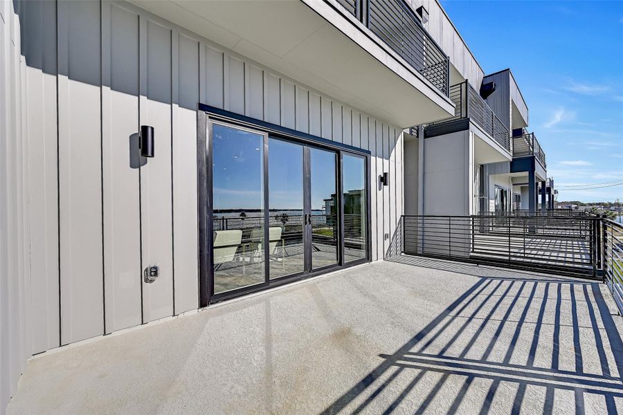 Exterior details and patio area of a home in Lago Pointe, Seabrook (Image 4).
