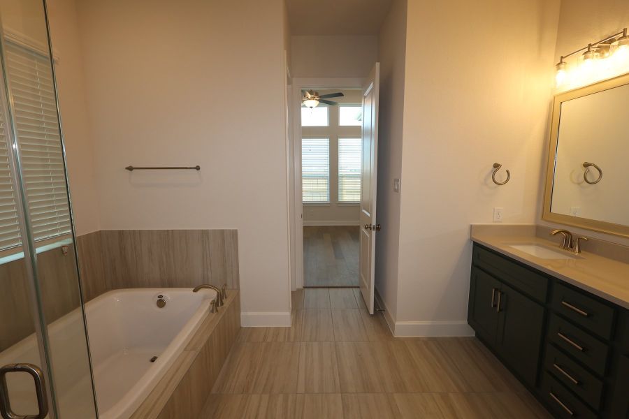 Furnished interior view inside a new home in Harvest Green - Reserve Collection, Richmond (Image 5).