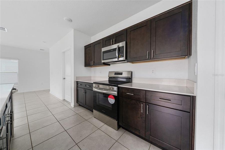 Furnished interior view inside a new home in Ranches at Lake Mcleod: Legacy Collection, Eagle Lake (Image 5).