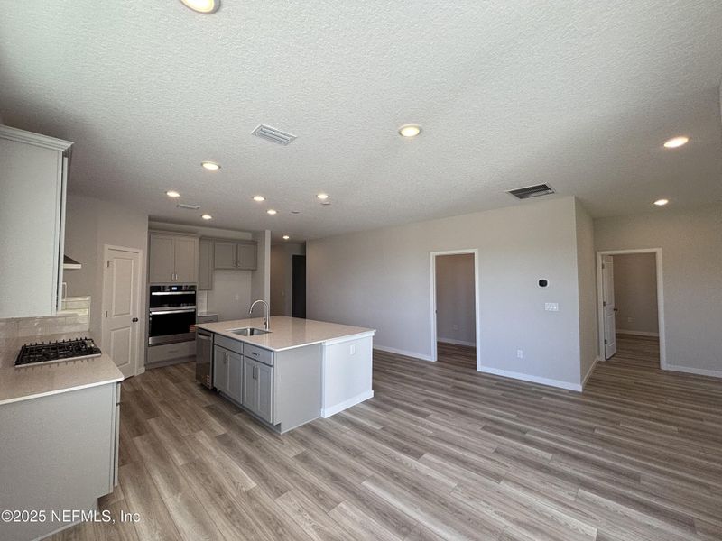 Furnished interior view inside a new home in The Magnolia Series at Reserve East, Flagler Beach (Image 8).