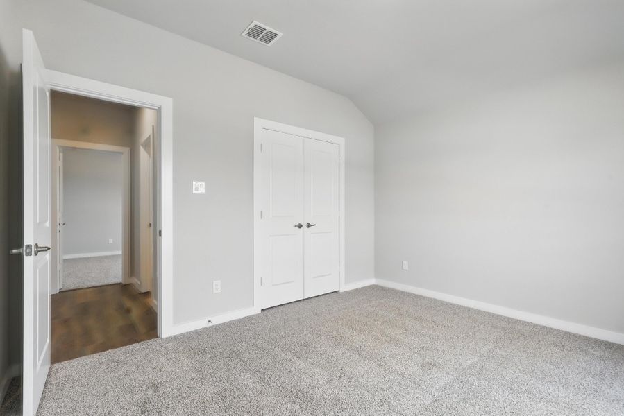 Representative unfurnished interior of a home built from the McKinley I by Cheldan Homes in Horizons at Bankston Estates, Venus (Image 37).