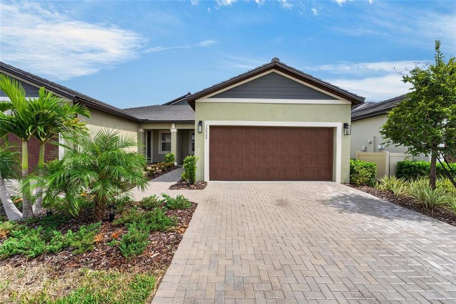 Front exterior of a new home in , Parrish, FL, highlighting curb appeal (Image 23).