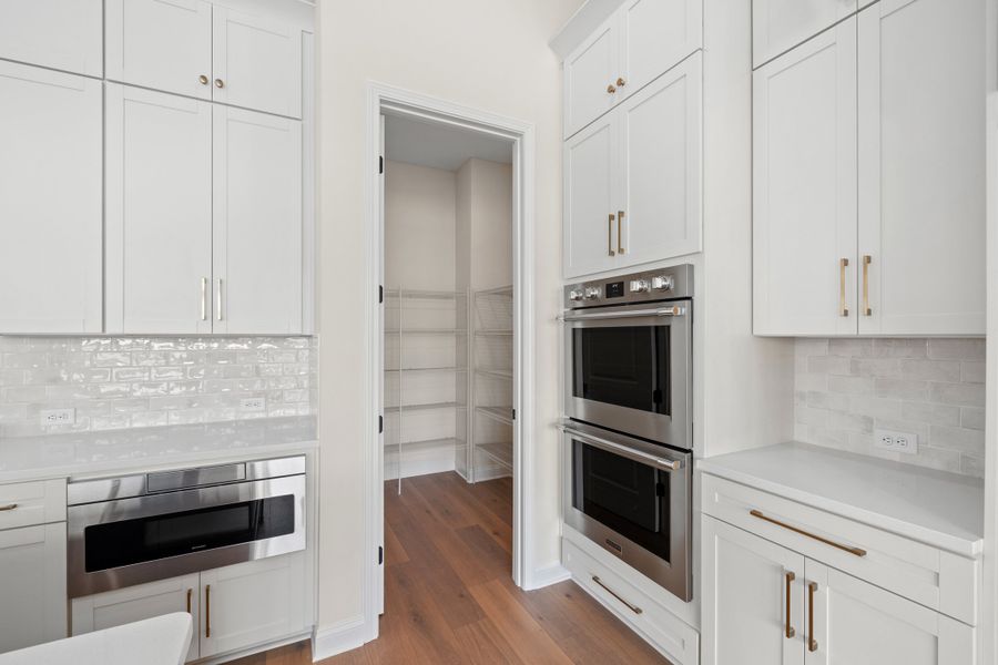 Representative furnished interior of a home built from the Aurora by Riverside Homes in Hidden Creek at SilverLeaf, St. Augustine (Image 15).