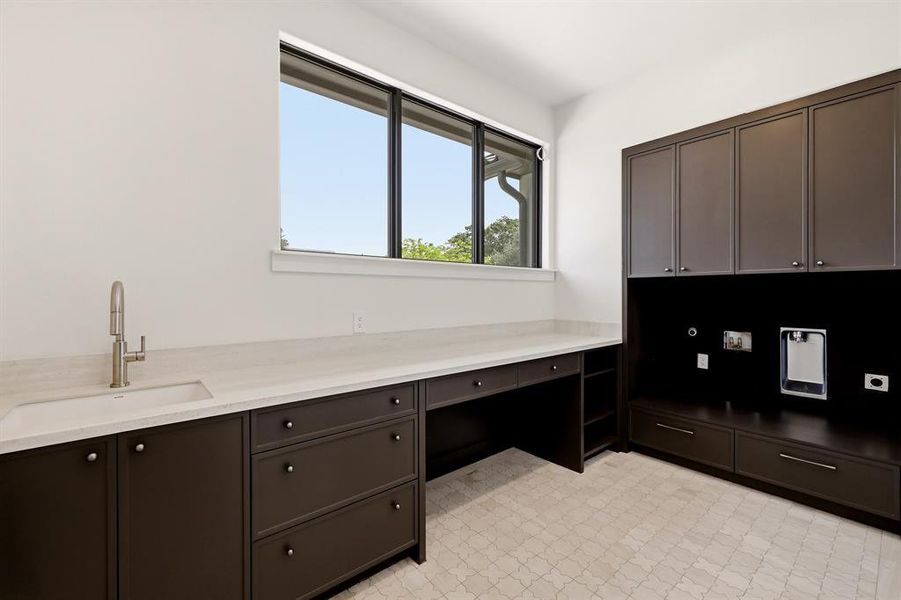 Upstairs laundry is one of three laundry options.