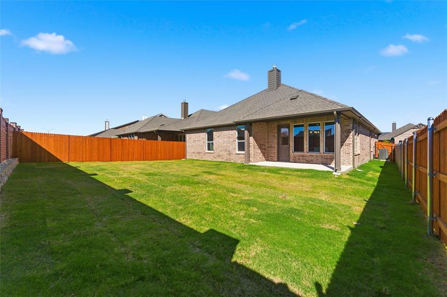 Exterior details and patio area of a home in Northstar, Haslet (Image 27).