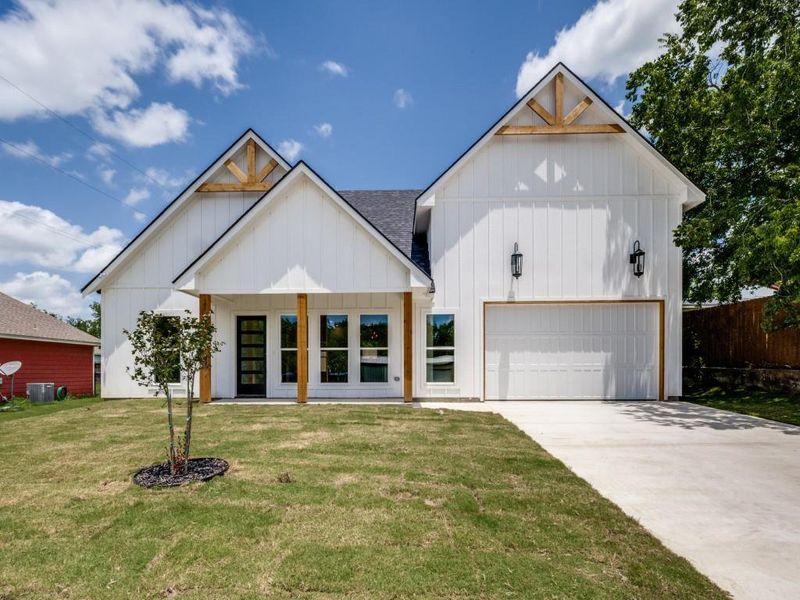 Front exterior of a new home in , Decatur, TX, highlighting curb appeal (Image 15). Front exterior of a new home in , Decatur, TX, highlighting curb appeal (Image 15).
