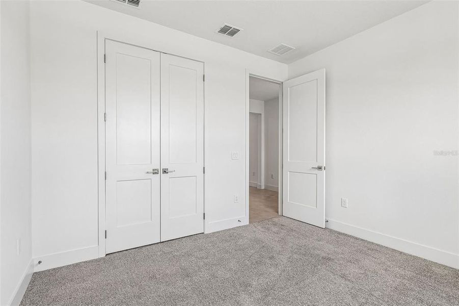 Spacious, unfurnished interior of a new home in Lakeside at Satilla, St. Cloud (Image 23).
