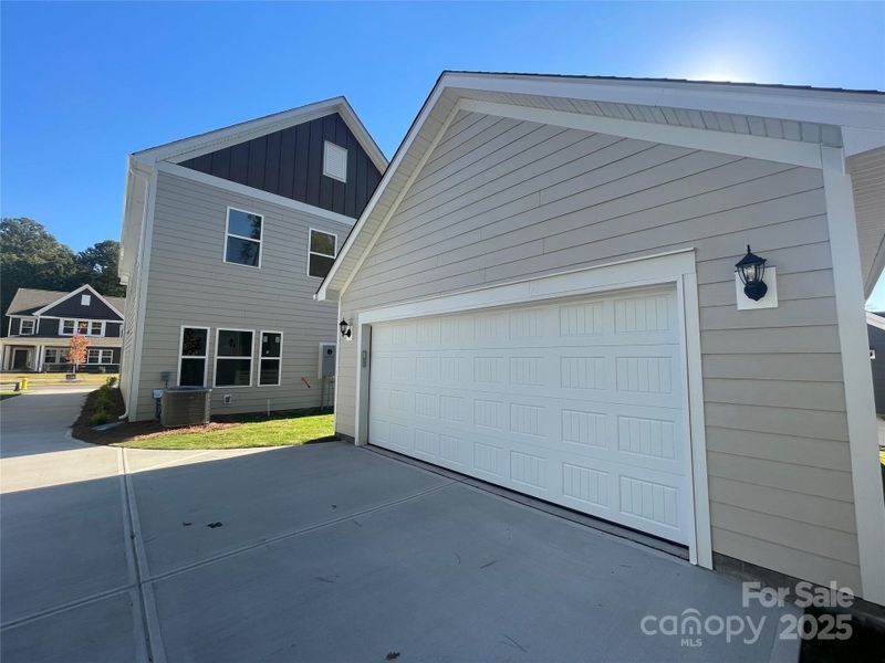 Exterior details and patio area of a home in Arbor Village, Matthews (Image 10).