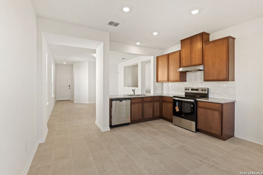 Furnished interior view inside a new home in Woodside Farms, Seguin (Image 10).