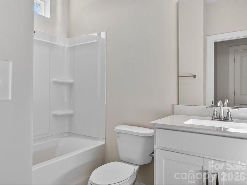 Furnished interior view inside a new home in Central Living at Craig, Charlotte (Image 9).